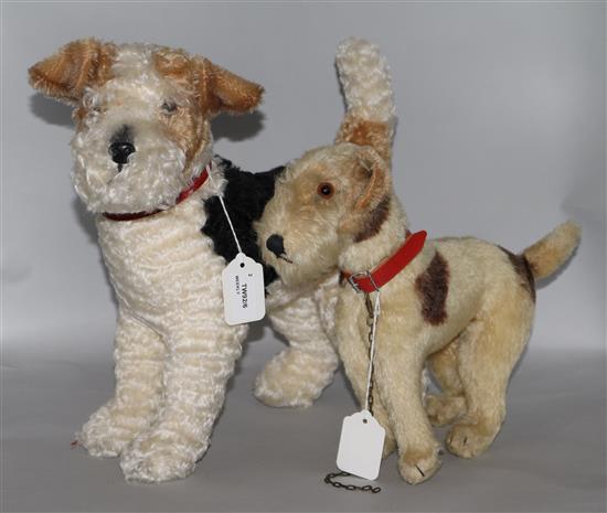 A Steiff Foxy Fox Terrier, model no. 931717, height 13.5ins (button in ear) and another smaller plush Fox Terrier